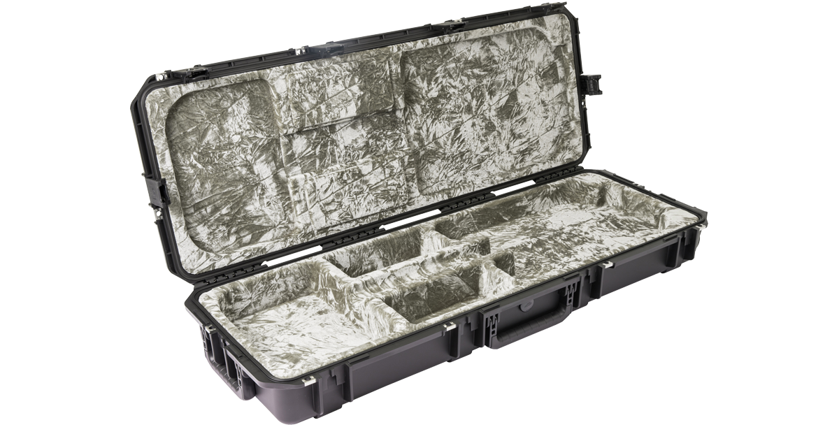 Interior view of waterproof electric guitar case with molded compartments and plush lining, designed for maximum protection and fit.