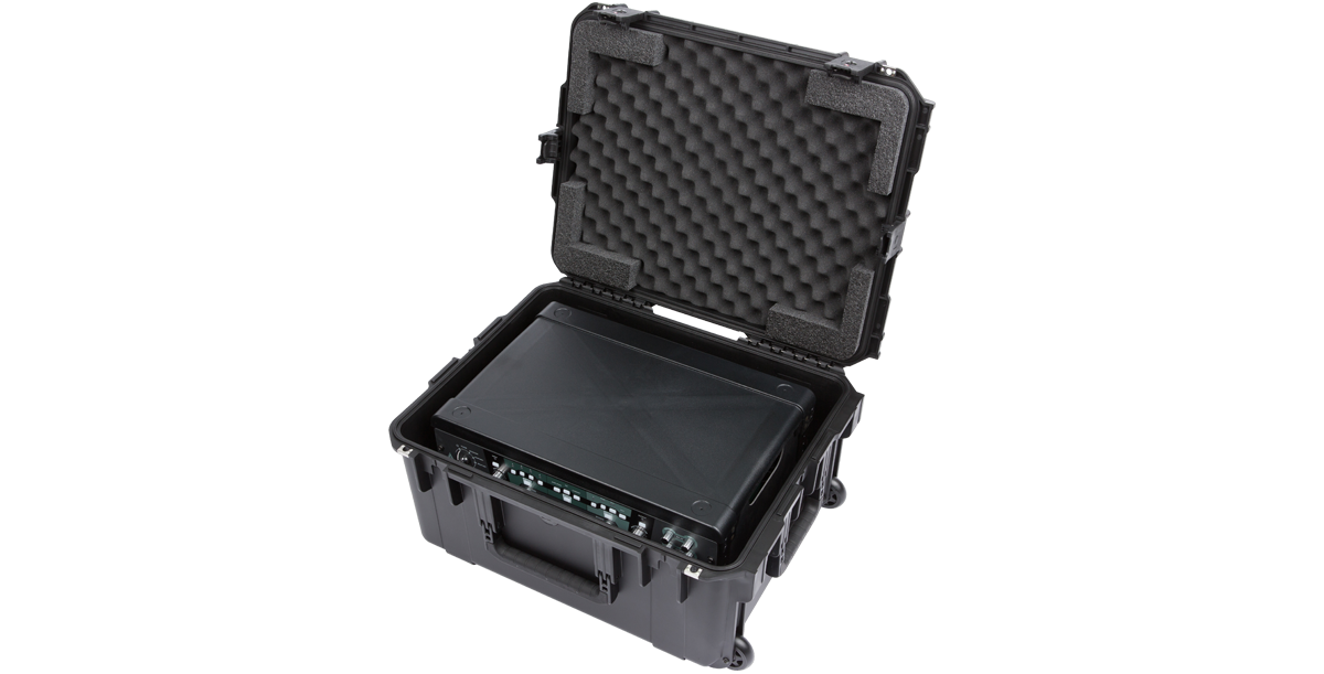 Angled open view of iSeries case with Fly Rack and Kemper Profiler, designed for shock resistance and TSA-approved travel.