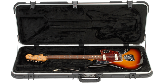 Fender Jaguar Case with Jazzmaster guitar inside, plush black interior and molded fit for secure transport and accessory storage.