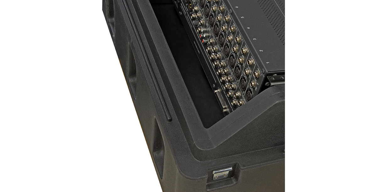 Close-up of Roto-Molded Gig Safe 14U Rack Case interior showing rear mixer connections, emphasizing cable management and accessibility.