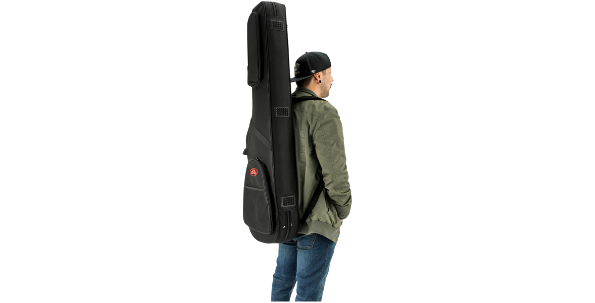 Man carrying Universal Electric Bass Soft Case on his back, demonstrating ergonomic backpack straps and portable design.