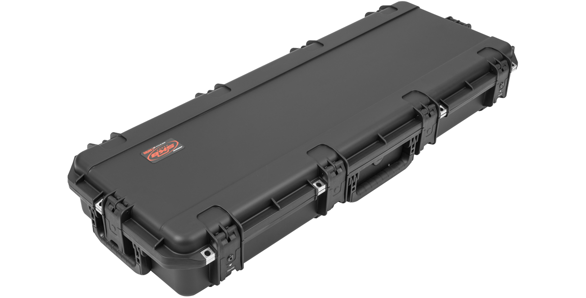 Side angle of iSeries Waterproof PRS Guitar Case closed, showing reinforced corners, TSA locks, and molded shell for durability.