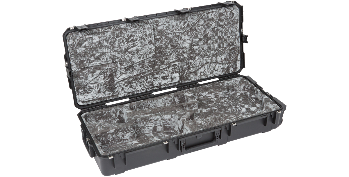 Empty SKB iSeries waterproof case for Jaguar Jazzmaster guitars, highlighting molded foam interior and reinforced latches.
