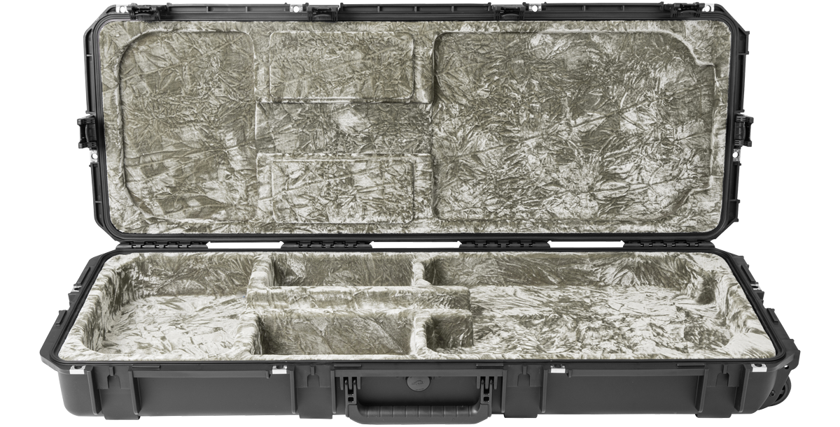Open waterproof guitar case with TSA-approved locks, featuring custom-molded interior for electric guitars and accessories.