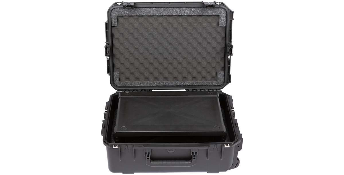 Open SKB 2U iSeries Fly Rack with empty rack frame inside foam-lined waterproof case, ideal for pro audio travel setups.