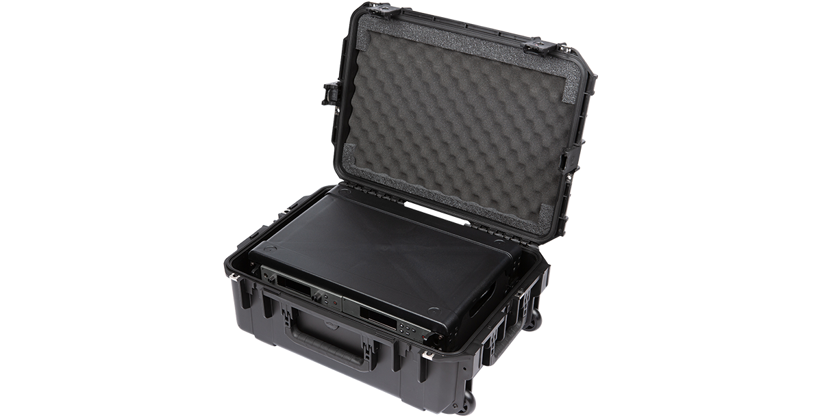 SKB 2U iSeries Fly Rack with gear inside open foam-lined case, designed for lightweight, waterproof, and impact-resistant travel.