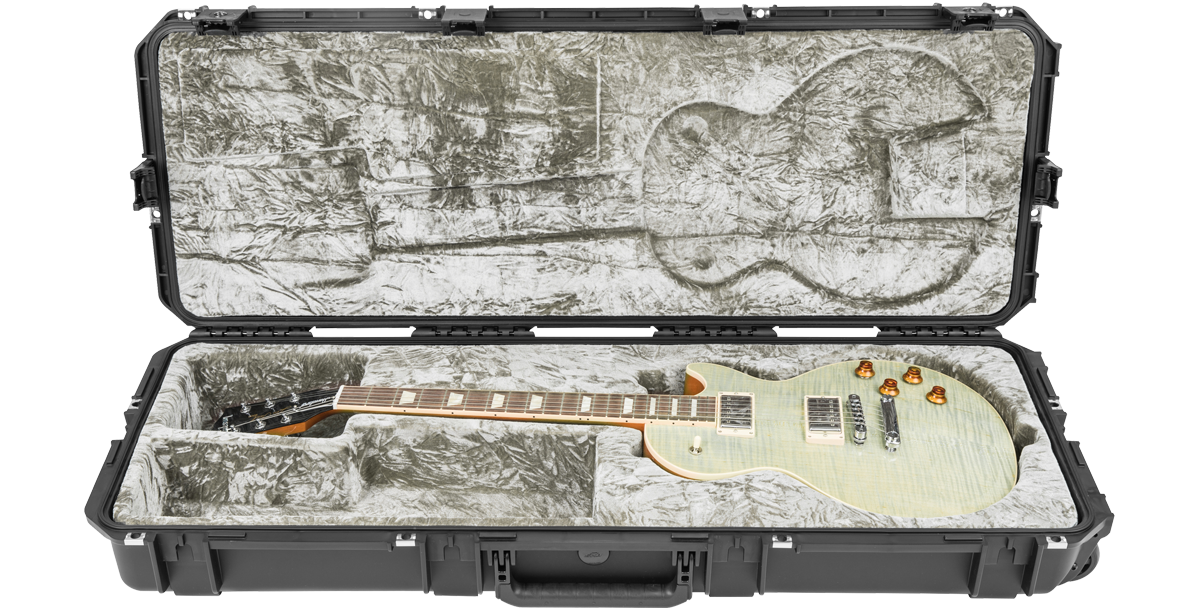 SKB iSeries Guitar Case - Les Paul Waterproof with platinum plush interior securely holding a white electric Les Paul guitar.