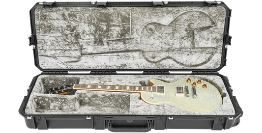 SKB iSeries Guitar Case - Les Paul Waterproof with platinum plush interior securely holding a white electric Les Paul guitar.