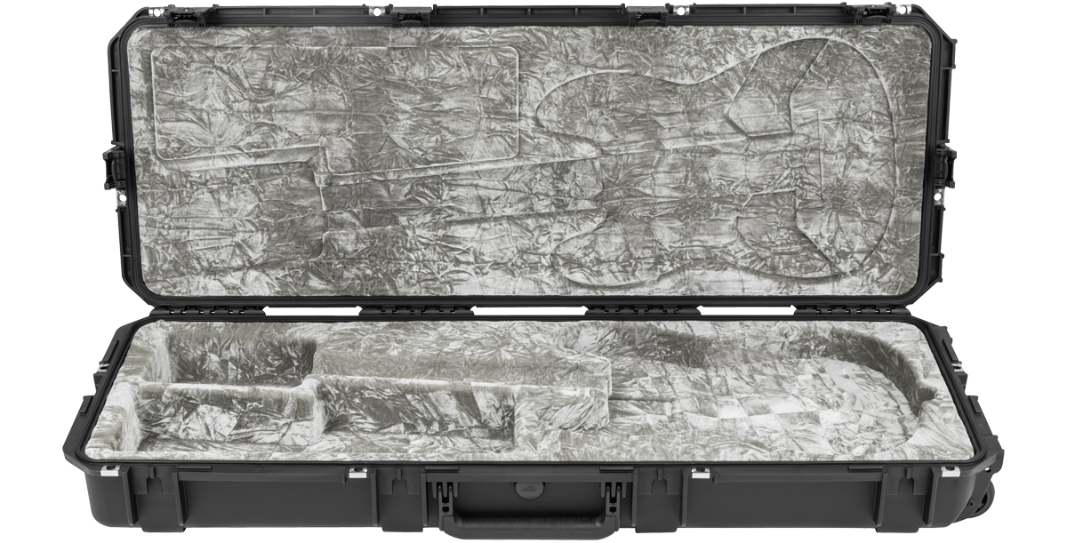 Interior view of waterproof guitar case for Strat Tele, highlighting contoured padding and protective compartments.