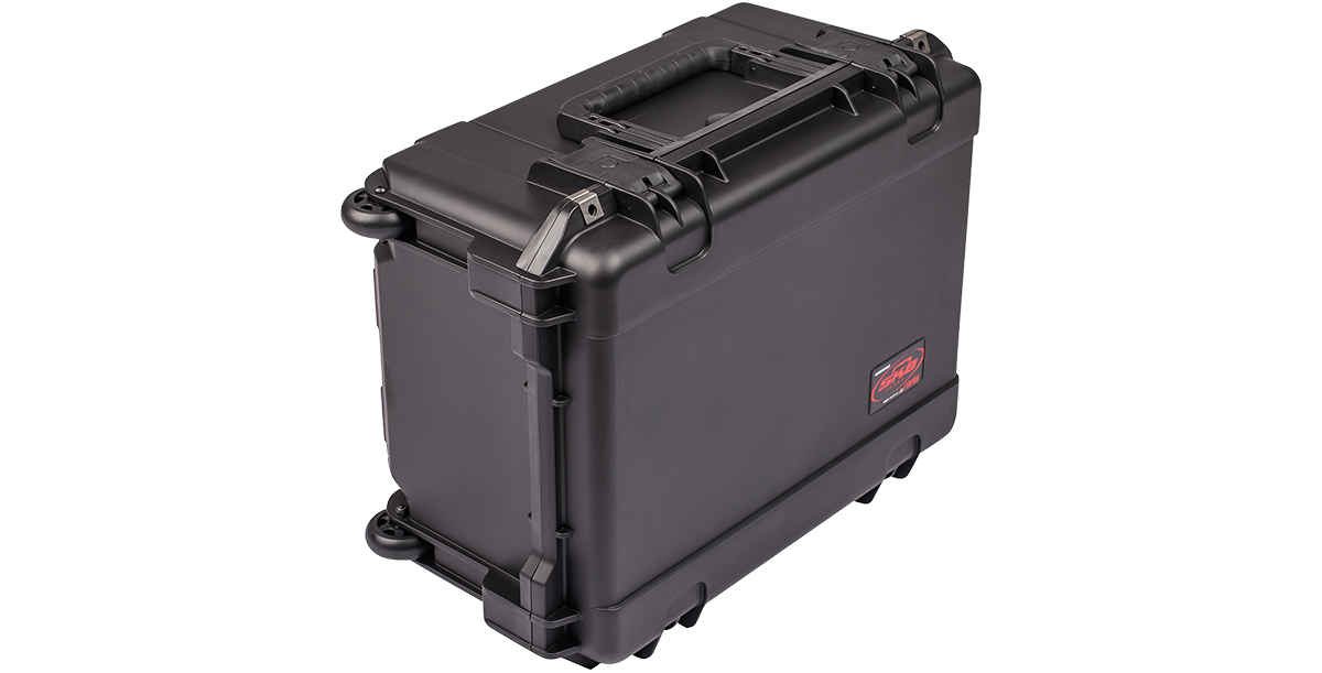 Side view of iSeries 2015-10 Case - Waterproof Case showing rugged wheels and handle, built for heavy-duty household or video use.