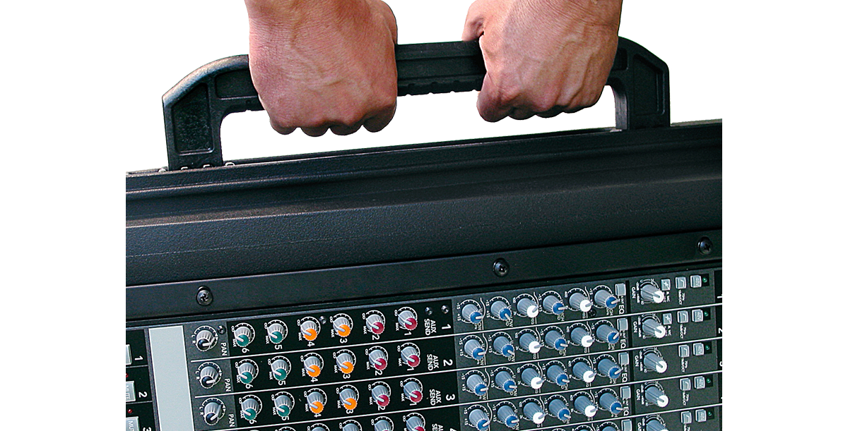 Hands gripping side handle of Roto-Molded Gig Safe 14U Rack Case, demonstrating its portable design for on-the-go audio professionals.