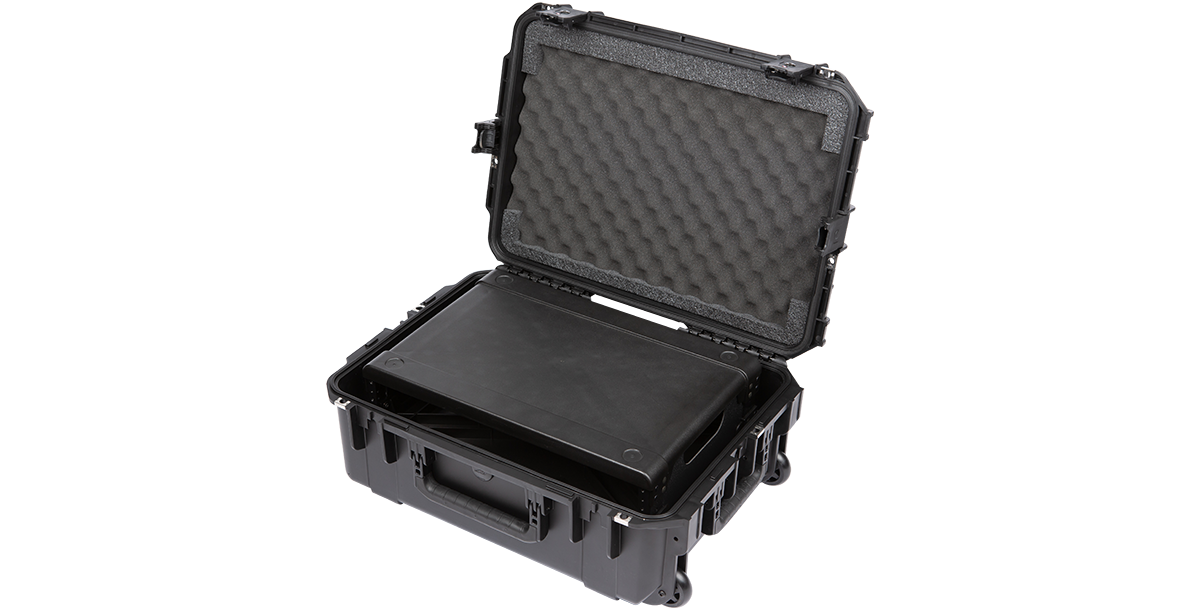 Angled open view of SKB 2U iSeries Fly Rack with empty rack, showcasing interior foam and molded case for secure transport.