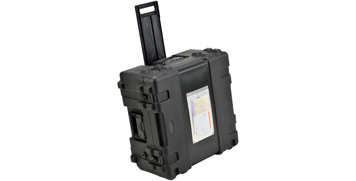 Aluminum Shipping Label Plate 12x7 attached to a black rolling case with extended handle, perfect for secure transport and identification.