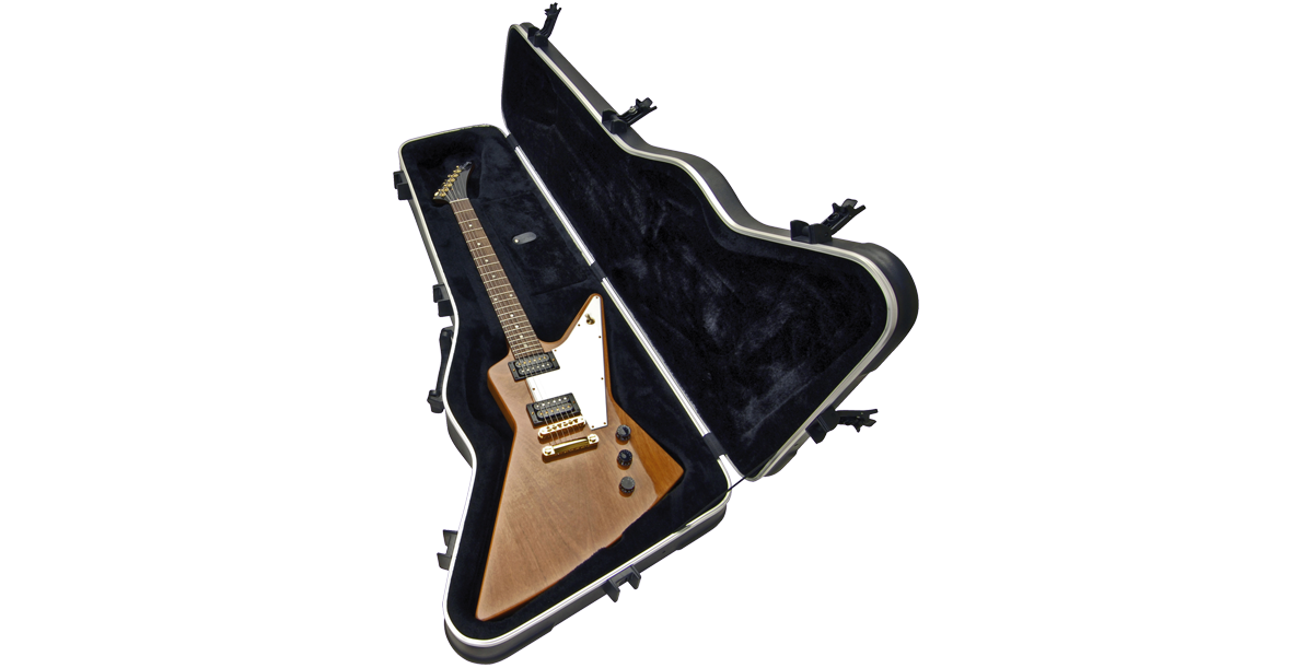 Firebird Guitar Case with natural finish Explorer® guitar inside, showcasing plush interior and accessory compartment for added convenience.