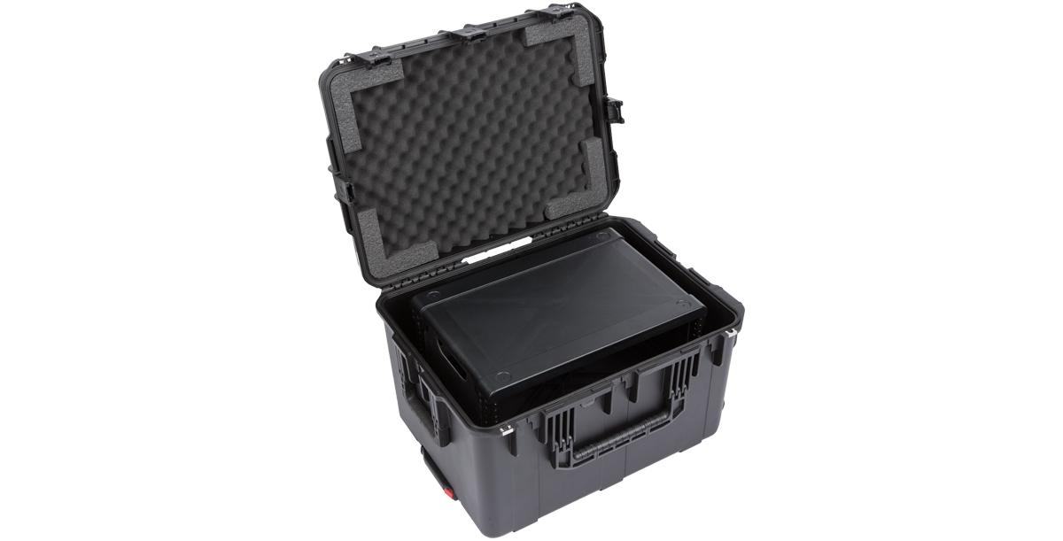 4U Molded Wireless Mic Fly Rack with open lid and angled internal rack. Built for secure transport of audio equipment and accessories.