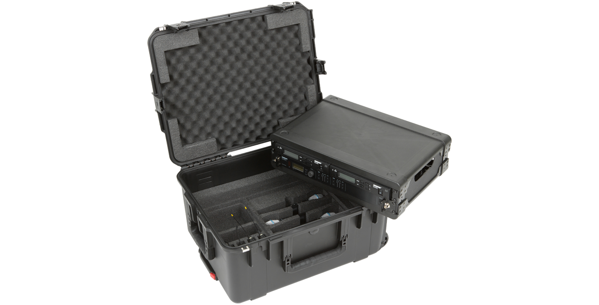 2U Wireless Mic Fly Rack partially removed from protective case, revealing internal foam compartments for accessories.