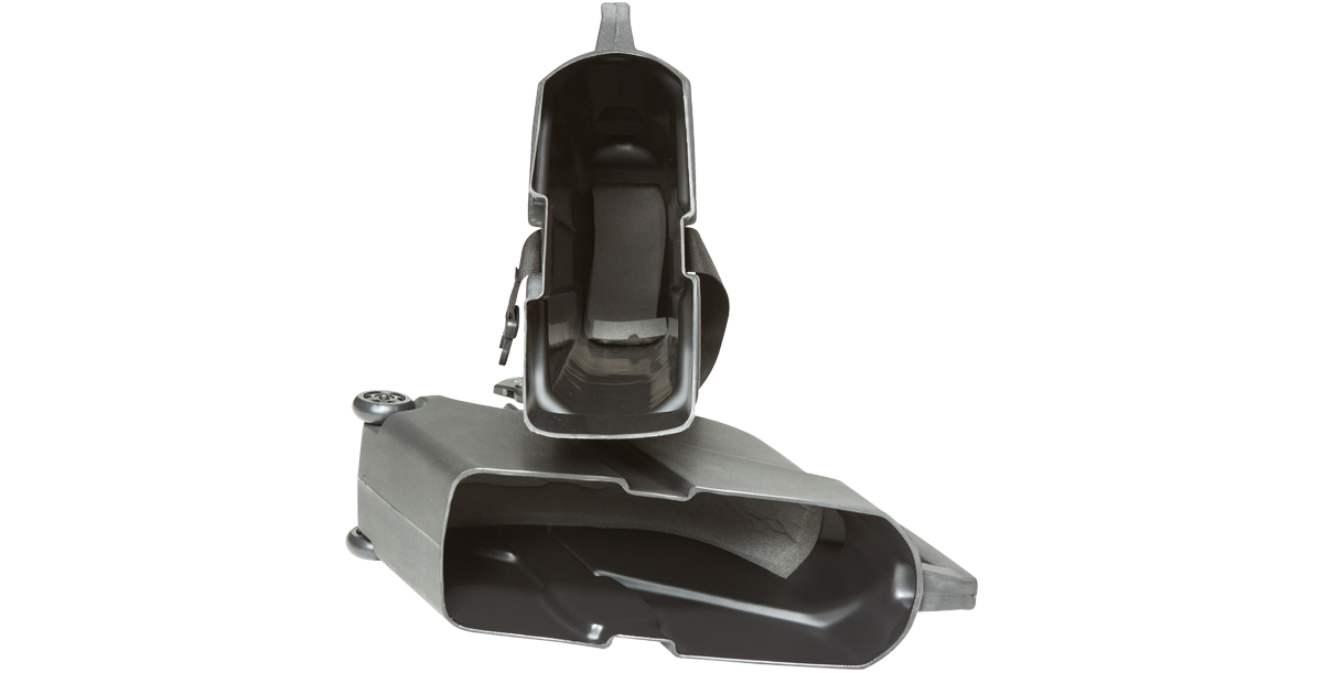 Interior view of ATA Bass Case with foam padding and molded compartments, ensuring secure bass guitar transport.