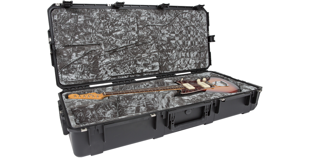 Full view of sunburst Jaguar Jazzmaster guitar in open SKB iSeries Waterproof Case with rugged exterior and custom grey foam interior.