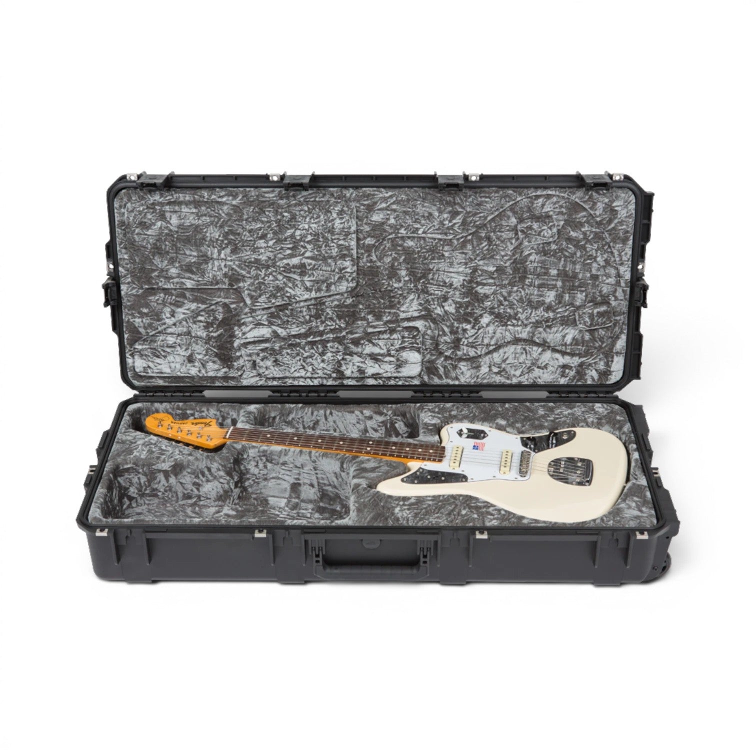 White Jaguar electric guitar inside waterproof SKB iSeries case, designed with TSA locks and contoured foam for maximum protection.