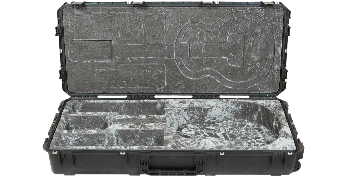 Interior view of Jumbo Acoustic Guitar Case showing custom-molded compartments and plush lining for secure guitar placement.
