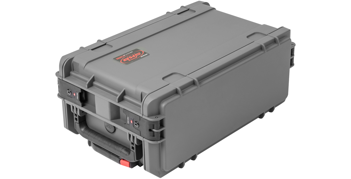 Angled view of compact molded rack in closed position with TSA latches and ergonomic handle, built for secure and lightweight gear transport.