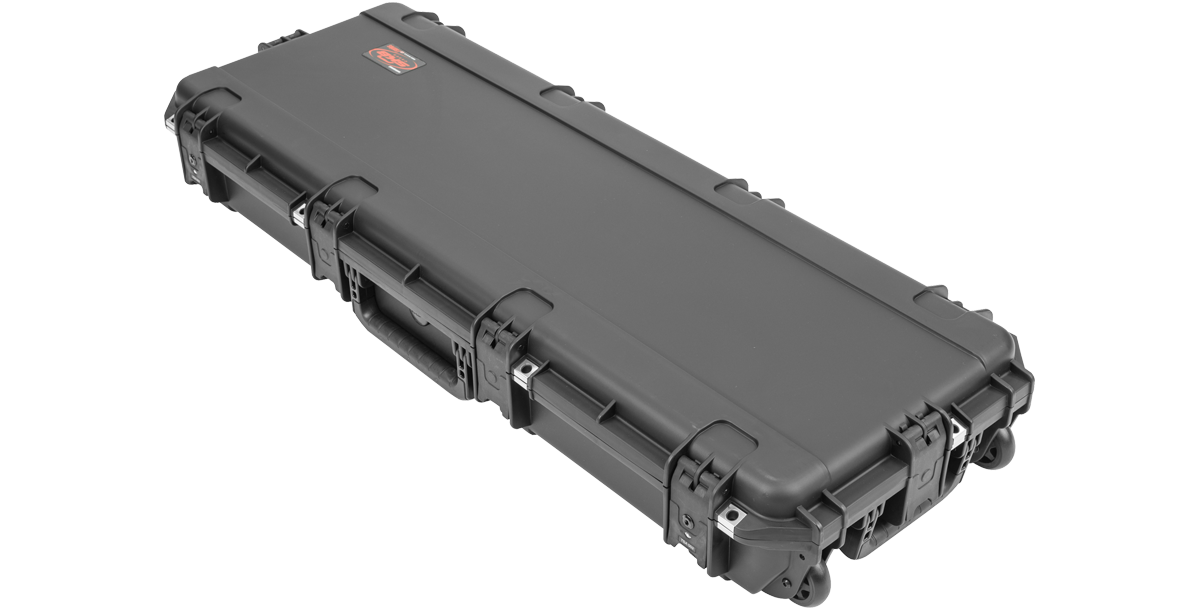 Angled side view of SKB iSeries Guitar Case - Les Paul Waterproof with heavy-duty latches and molded handle.