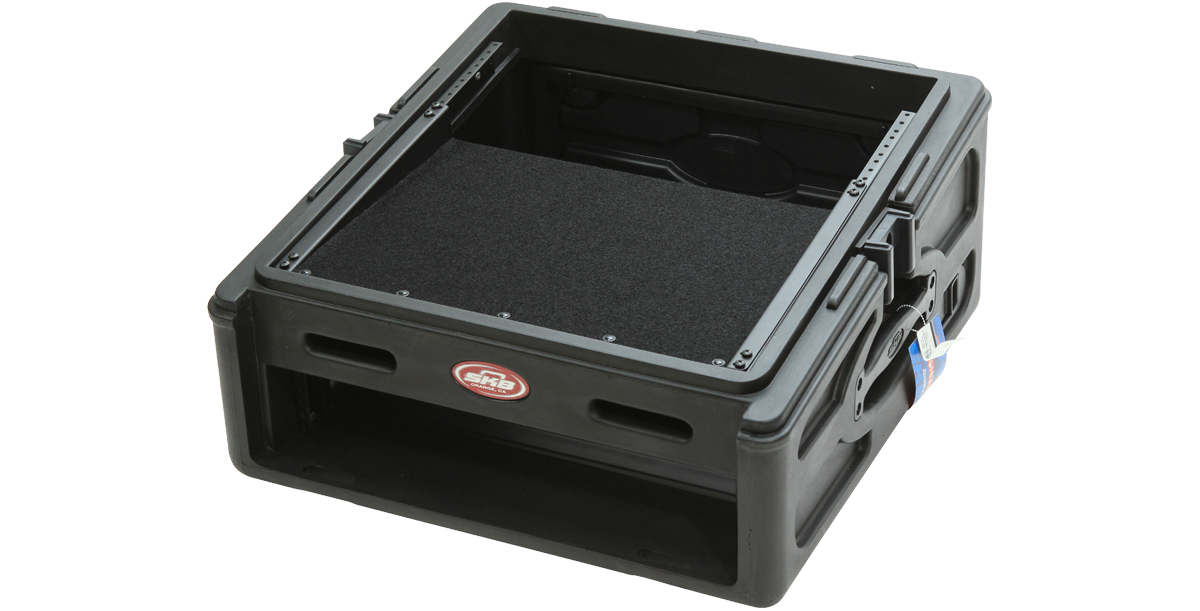 Angled view of Velcro Rack Shelf mounted in a slant rack case, providing a stable surface for non-rackmount gear in audio environments.