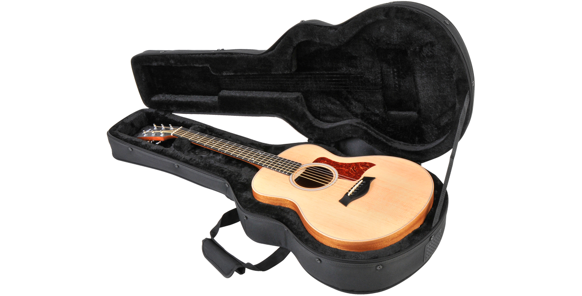 Sturdy GS Mini protective case open with acoustic guitar inside, highlighting snug fit and interior cushioning for travel protection.