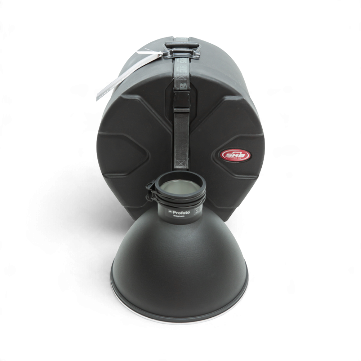 SKB Cases 12x12 roto-molded D-shaped drum case with Roto-X pattern and sure grip handle, shown with a studio reflector.