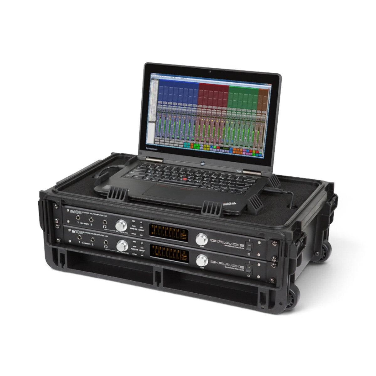 SKB Cases 2U Studio Flyer rack case with a laptop on the work surface and two rack-mounted audio interfaces.