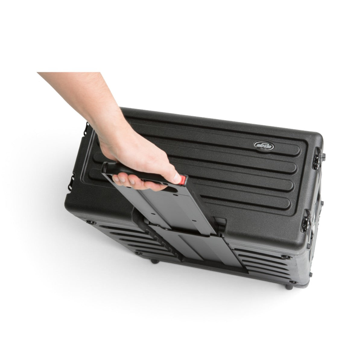 SKB Cases 4U rSeries rolling rack in black polyethylene with a hand pulling the integrated one-touch handle