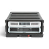 SKB Cases 4U rSeries rolling rack in black polyethylene with two mounted QSC amplifiers inside