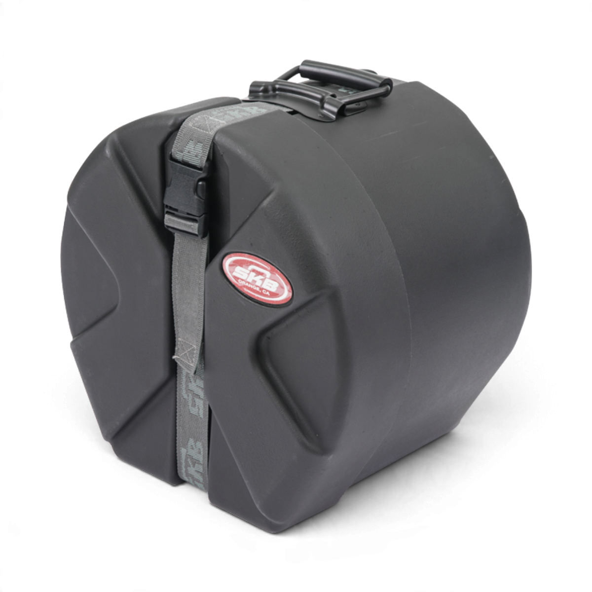 SKB Cases drum case with black Roto-X ribbed exterior, secure strap, and red brand logo on a white background.