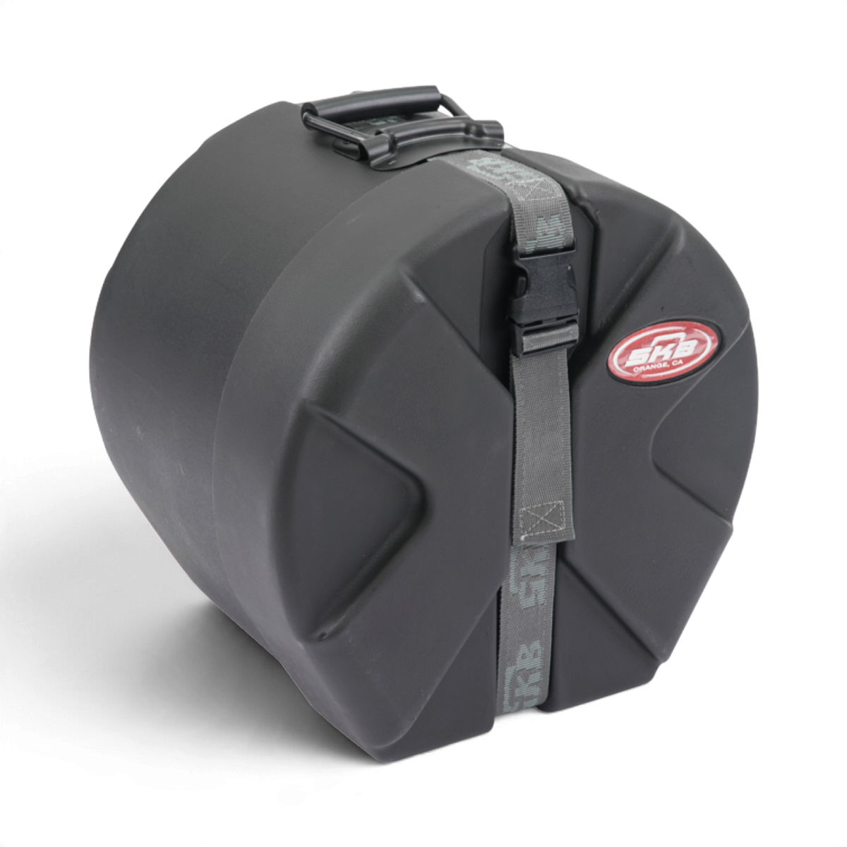 SKB Cases black Roto-X drum case with a D-shaped design, secure strap, and protective molded rib pattern.