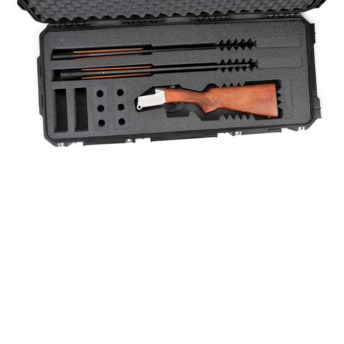 SKB Cases iSeries 3614-6 waterproof breakdown shotgun case with custom foam interior holding a receiver and two barrels.