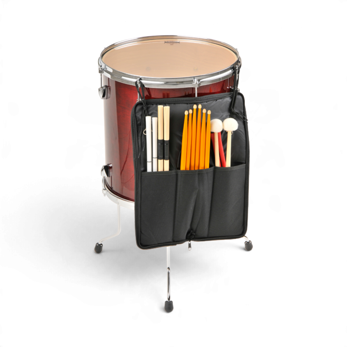 SKB Cases deluxe stick bag in black nylon mounted on a red drum, featuring multiple pockets filled with drumsticks.