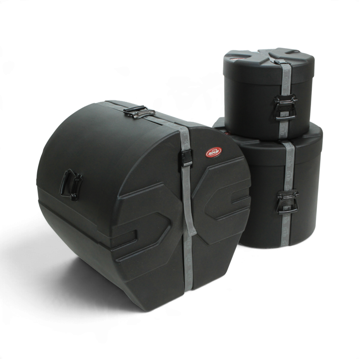 SKB Cases Drum Package 2 featuring three black molded hardshell drum cases with Roto-X rib patterns and secure straps.