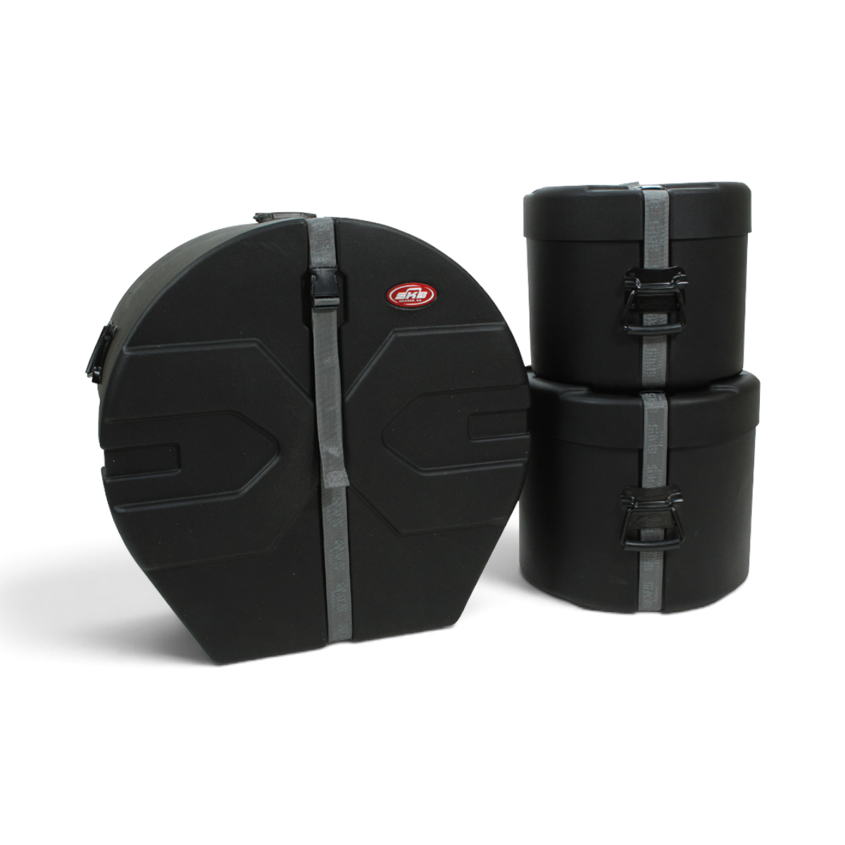 SKB Cases Drum Package 1 featuring three black molded plastic drum cases with Roto-X ribbing and secure strap closures.