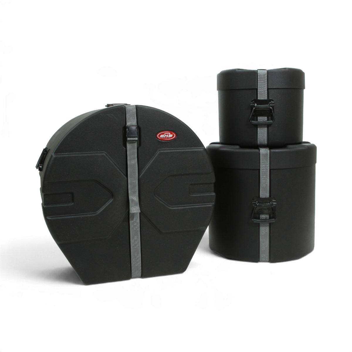 SKB Cases Drum Package 2 featuring three black molded hardshell drum cases with Roto-X ribbing and secure straps.