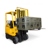 SKB Cases 3R Forklift Riser Kit installed on an olive green hard case being lifted by a yellow industrial forklift.