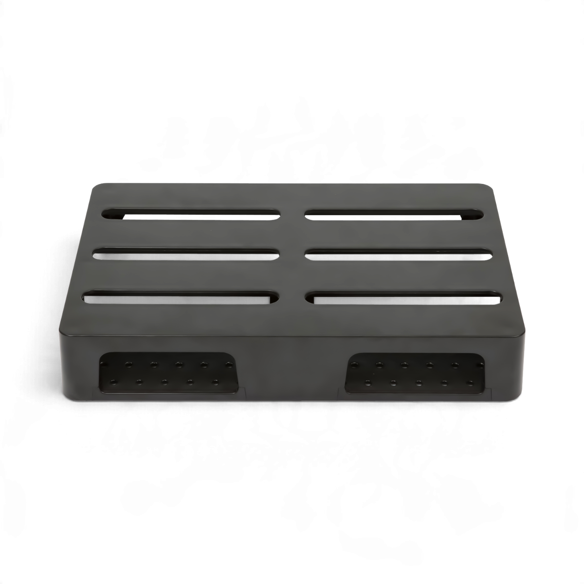 SKB Cases injection molded black ABS pedalboard with slots for cable management and under-mount power supply storage.