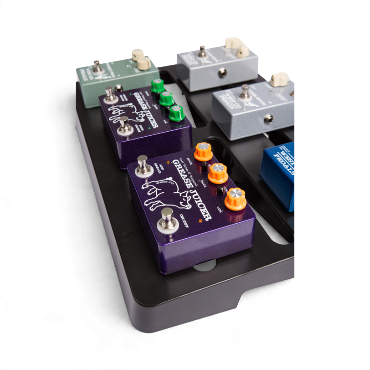 SKB Cases injection molded black pedalboard holding various colorful guitar effect pedals on a white background
