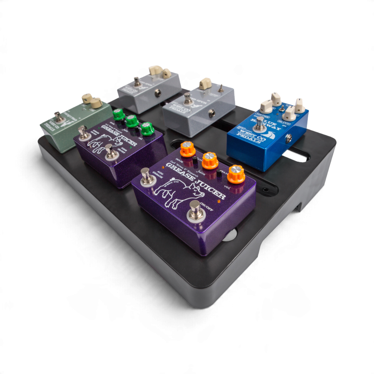 SKB Cases injection molded black ABS pedalboard holding five colorful guitar effect pedals on a white background.