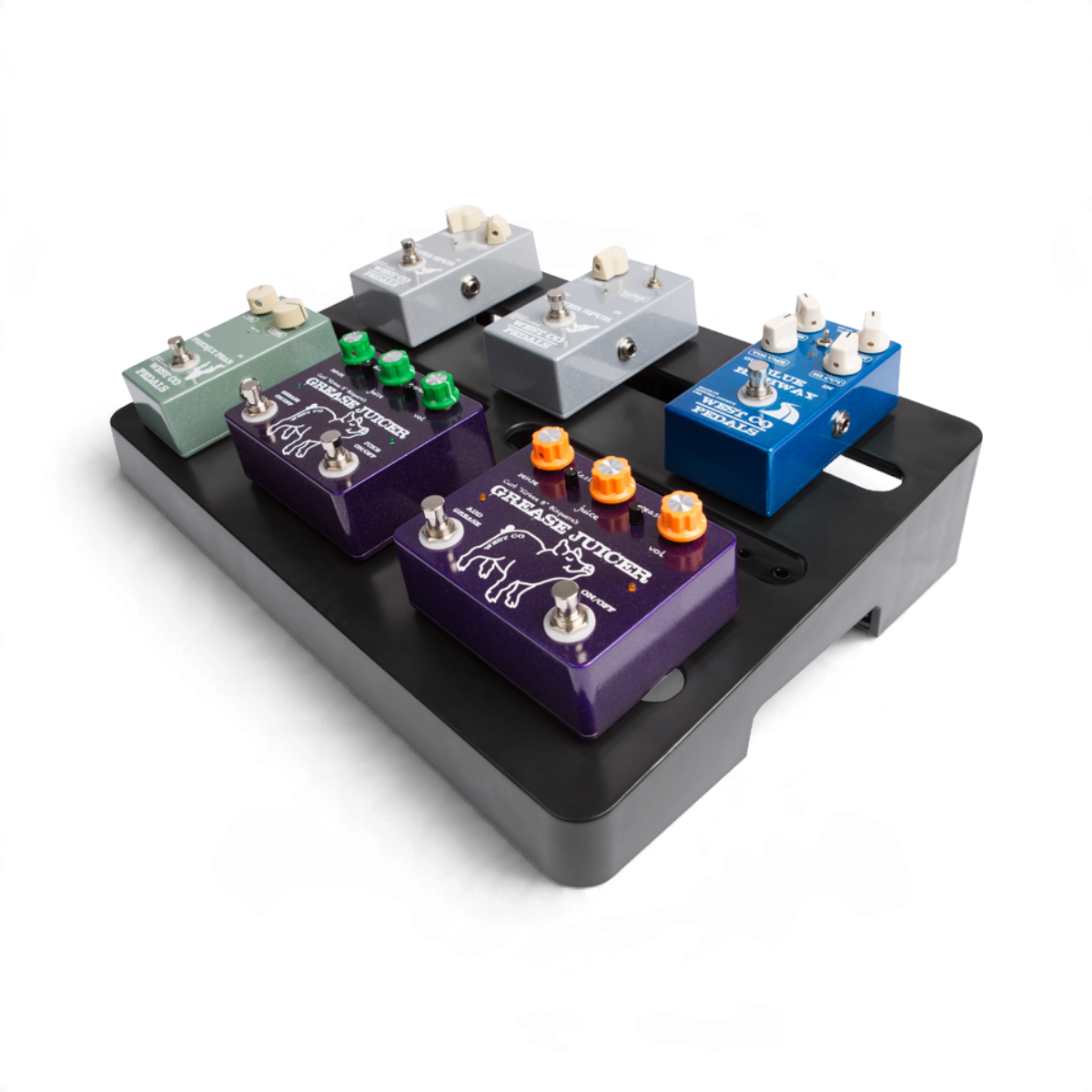 SKB Cases injection molded black ABS pedalboard holding six colorful guitar effect pedals on a white background
