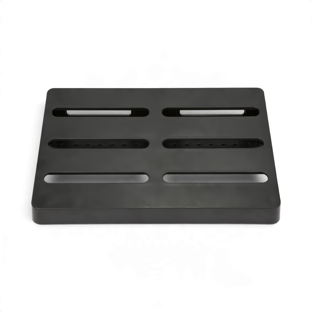 SKB Cases injection molded black ABS pedalboard with slots for cable management and pedal mounting