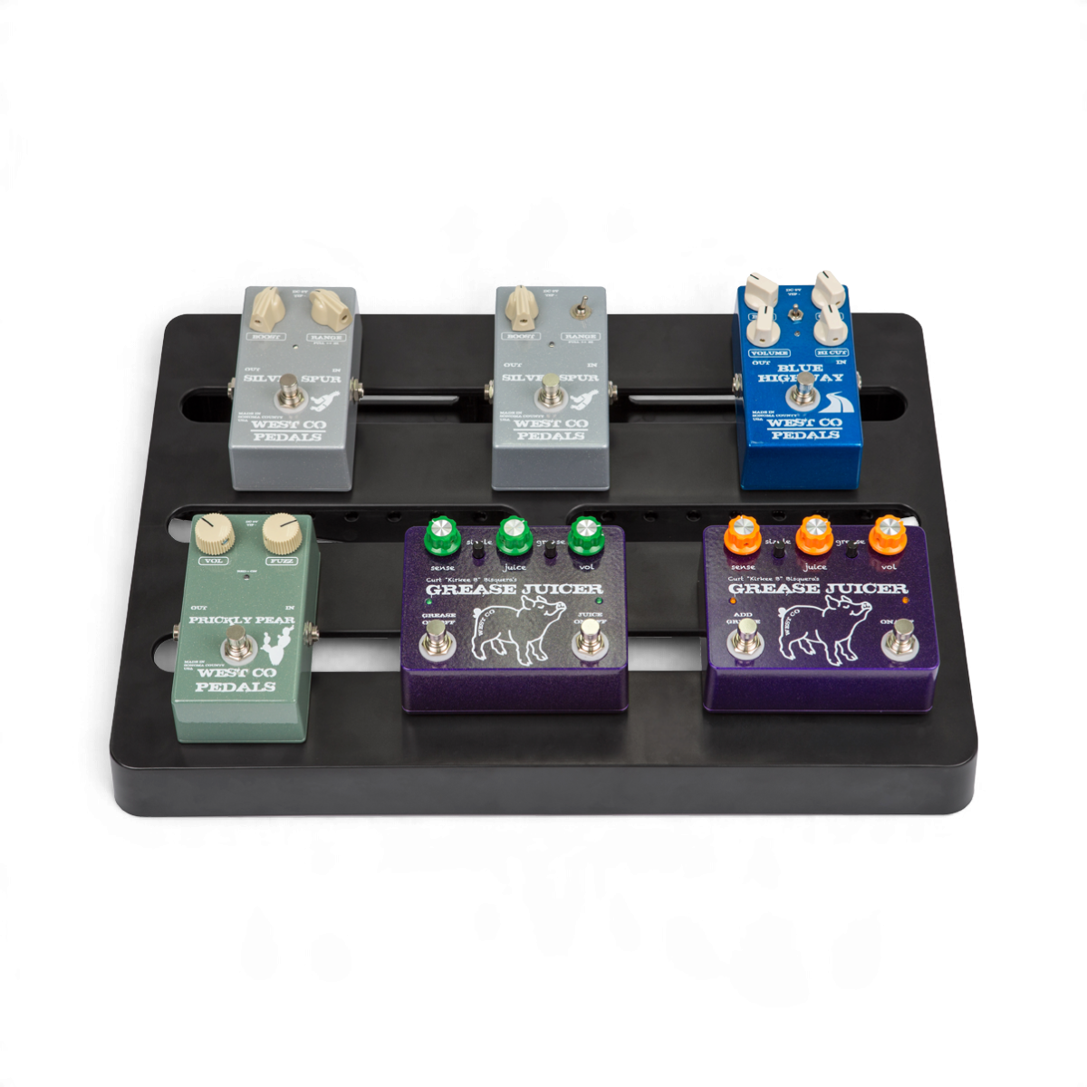 SKB Cases injection molded black ABS pedalboard holding five colorful guitar effect pedals on a white background
