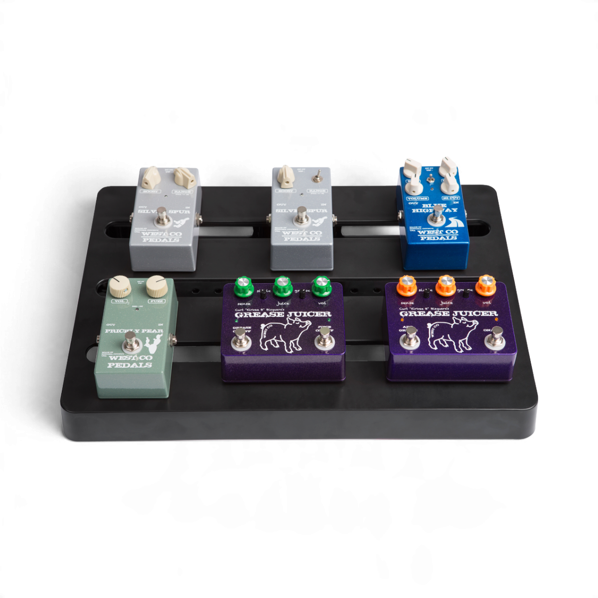 SKB Cases injection molded black pedalboard holding five colorful guitar effect pedals on a white background.