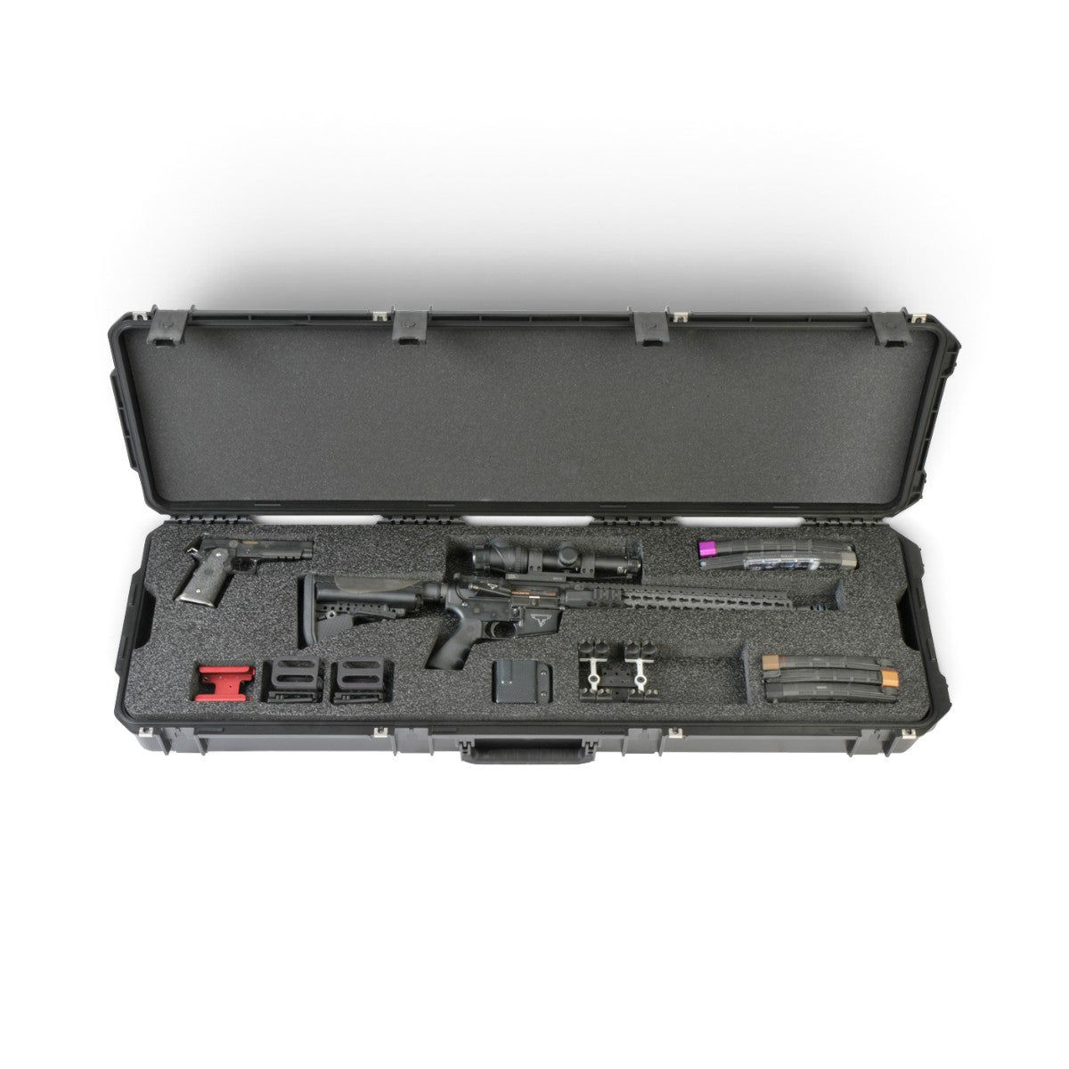 SKB Cases iSeries 3-gun competition case with custom foam interior holding a rifle, pistol, and magazines.
