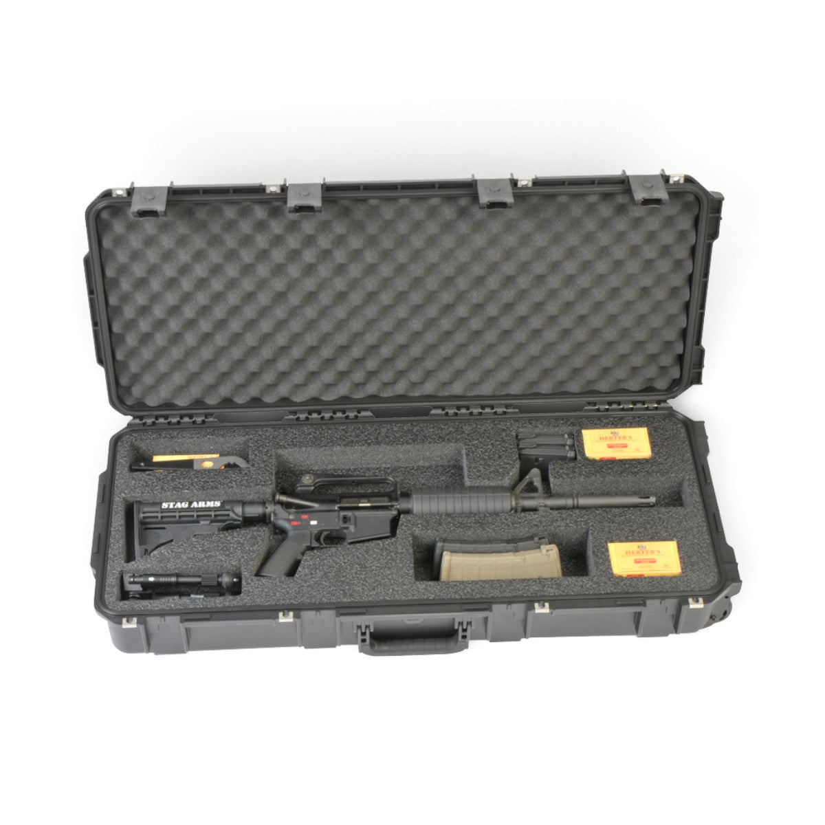 SKB Cases iSeries 3614-6 AR rifle case with custom high-density foam interior holding a tactical rifle and accessories.
