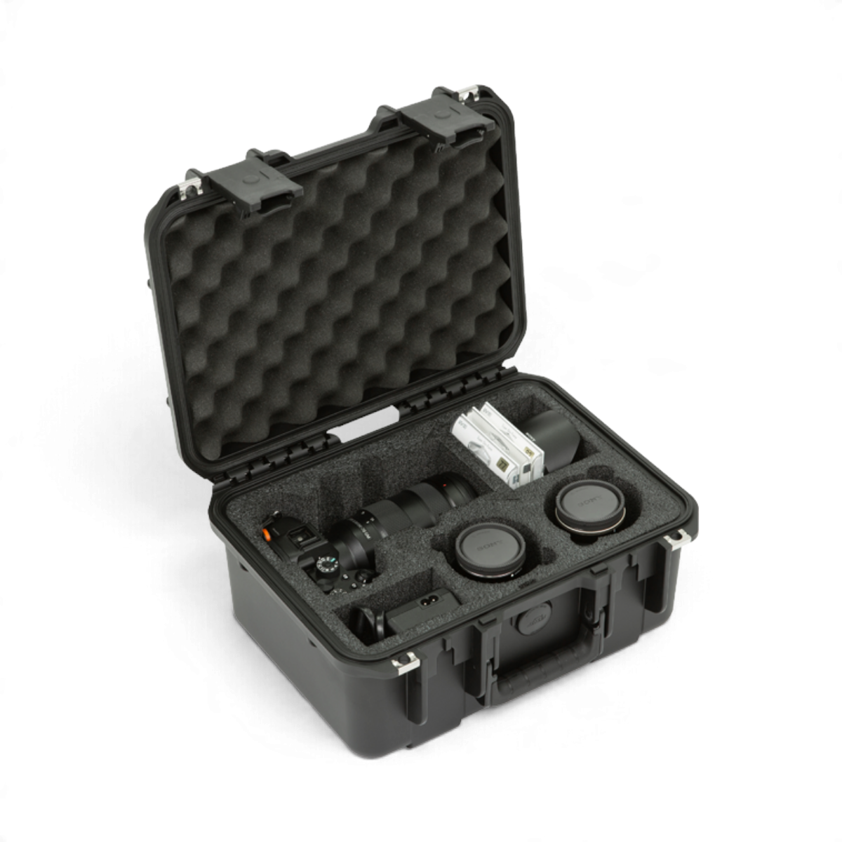SKB Cases iSeries 1309-6 waterproof hard case with custom foam interior holding a Sony camera and lenses